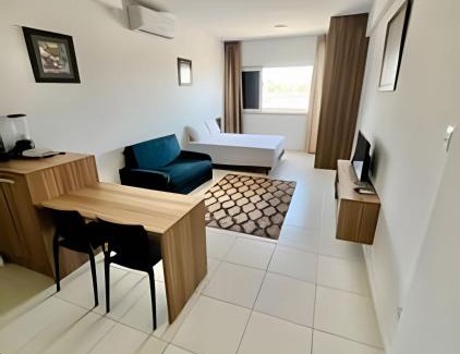 Armacao Apartment | UNU Studio Armação; Frente/Vista mar, piscina e +