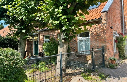 Dornum Apartment | Vacation apartment Nordnest on historic Gulfhof