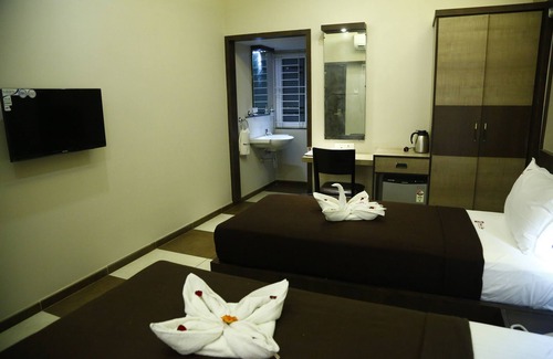 Thanjavur Hotel | VEDHASSTAY