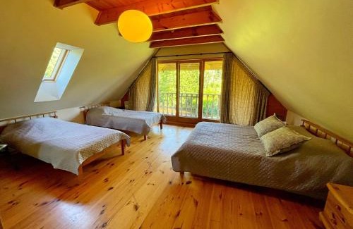 Igums Villa | Veinbergu guest house by lake n sauna 'Vidusķēķi'