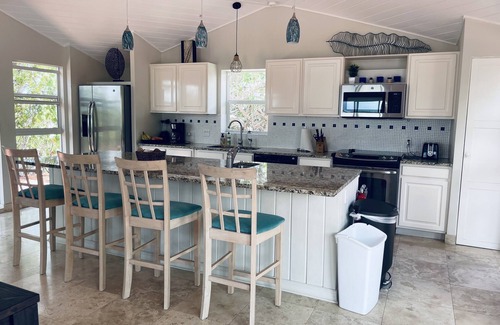Ocean Point Villa | VILLA SERENE—2 Bed, 2.5 Bath Villa with Beach Access just steps to Sapodilla Bay