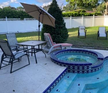 Collins Estates House | Walk to Indian Rocks Beach Exclusive Use of Hot Tub, Pool, BBQ,with Privacy