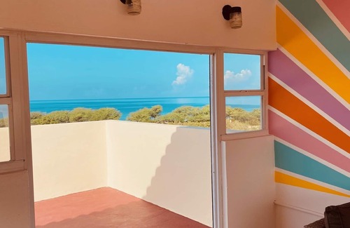 El Combate Condo | Walk-up penthouse w/breathtaking views, WiFi, A/C, free laundry, sleeps 6