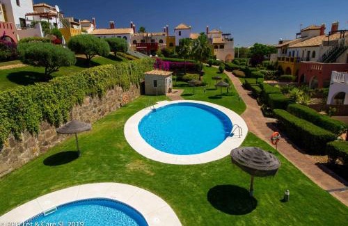 Costa Esuri House | (WAR002) Town House with Garden and Pool Access