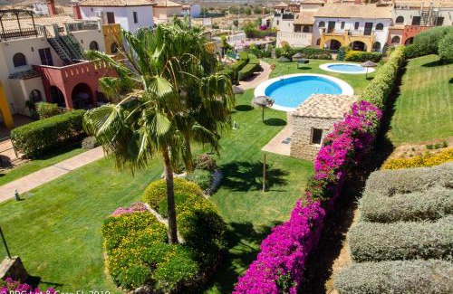 Costa Esuri House | (WAR002) Town House with Garden and Pool Access
