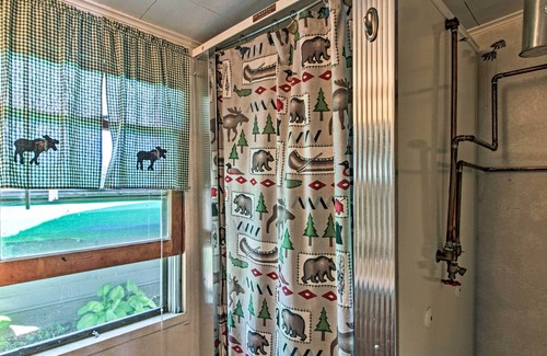 Deerwood Cabin | Waterfront Getaway w/ Beach, Paddle Boat, Fire Pit