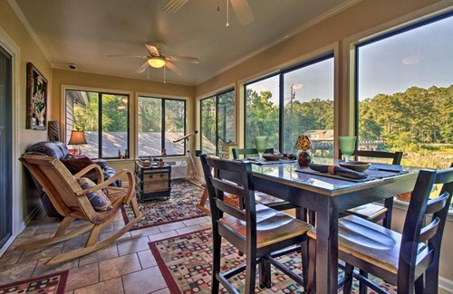 Midway House | Waterfront Midway Home with Sunroom and Large Yard