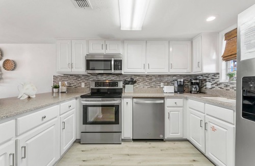 Miramar Beach Villa | Waterside Dreams with Private Beach and Next To World Famous Pompano Joe's
