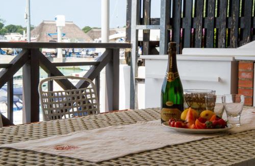 Lignano Riviera Apartment | Welc-ōM Lignano swim and fun with dock view