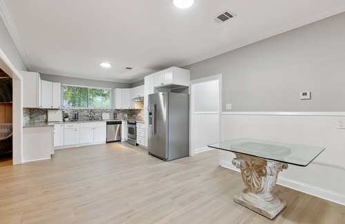 Mid City North House | Welcome to The Henderson House! Great for large groups and commercial housing!