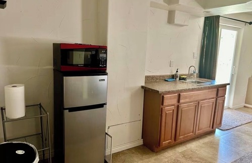 Parker House | Welcoming huge basement with 1 bed and private kitchen and bath with in Parker