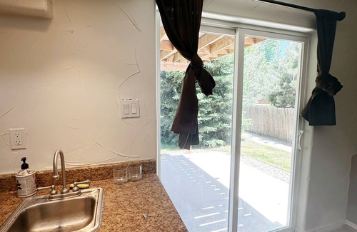 Parker House | Welcoming huge basement with 1 bed and private kitchen and bath with in Parker