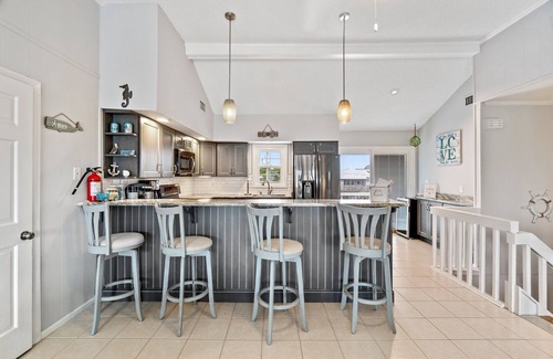 Sandbridge House | When you’re at the beach, you want to just relax! Paws and Relax here.