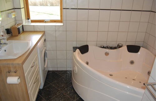 Bog By House | With a view of Bogø and Grønsund lies this beautiful cottage.