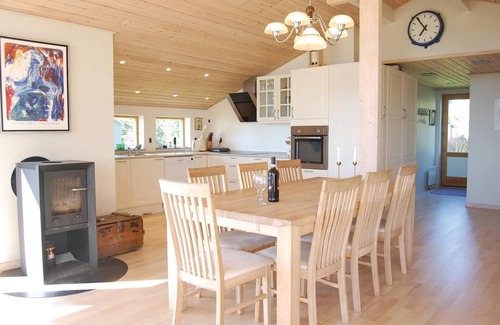 Bog By House | With a view of Bogø and Grønsund lies this beautiful cottage.
