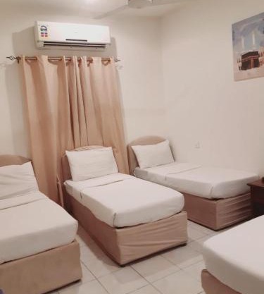 مكة المكرمة غرف عائلية فندق بجوار الحرم تخفيضات للمجموعات ناحية برج الساعة Makkah room in HOTEL near ALHARAM Multiple ROOM