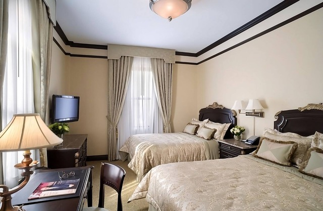 2 Superior 2 Double Beds at The Lucerne Hotel, Rooftop Dining!
