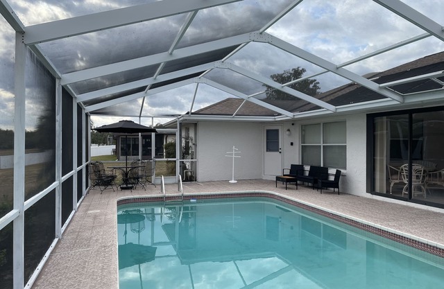 3/2 spacious house w/screened in pool perfect for a BIG Family.getaway