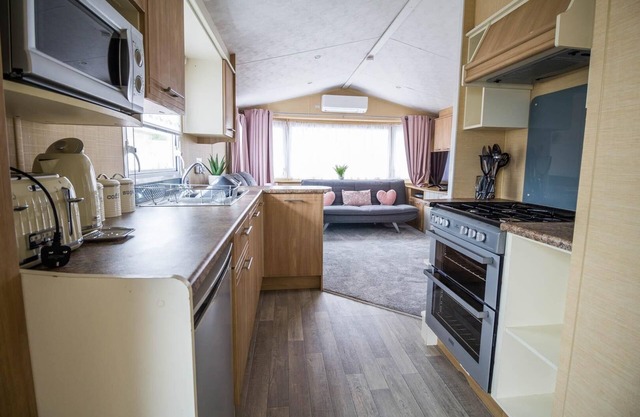 6 berth caravan with decking and WiFi at North Denes in Suffolk ref 40113ND