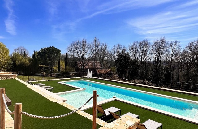 A SINGLE Gîte with large heated swimming pool, large garden and view of the forest