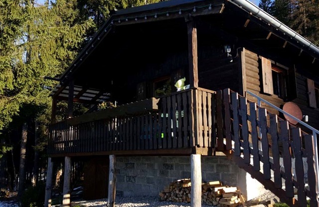 Alpine hut in secluded location on the edge of the forest, with forest playground for children