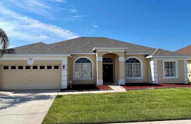 Ample space and modern elegance await at this 5/3 Pool Home located at Highlands Reserve Golf and Country Club