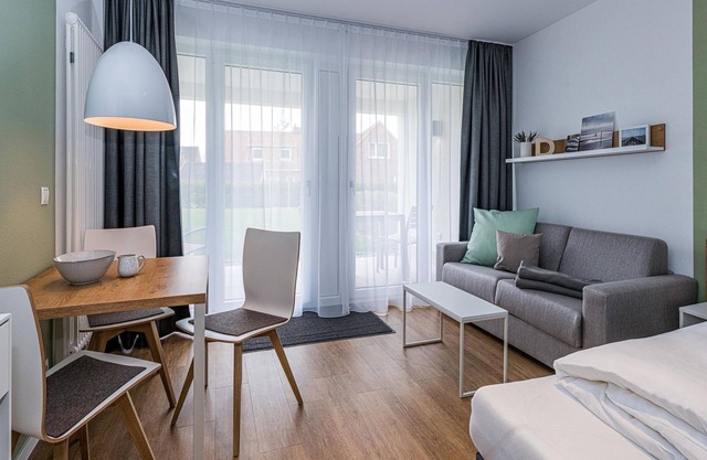 Apartment near the North Sea with terrace, parking, use of swimming pool & sauna -
