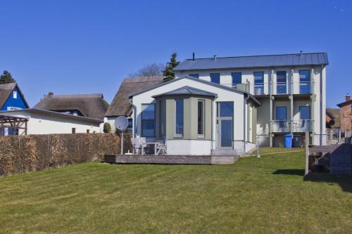 Balkon mit Meerblick, ruhige Lage - Ferienhaus Distelfink FeWo 01
