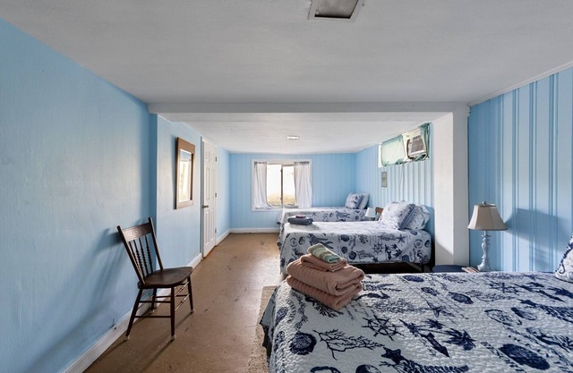 Beach Front On The Bay In Our Rustic Beach 4 Bedroom Cottage by RedAwning