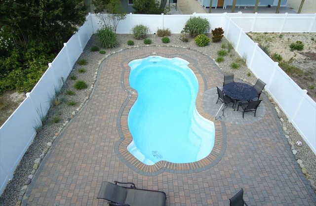 Beautiful 8 bedroom, 4 full and 3 half baths with private inground pool
