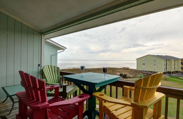 Beautifully Updated TOP FLOOR Condo with Ocean & Pool Views
