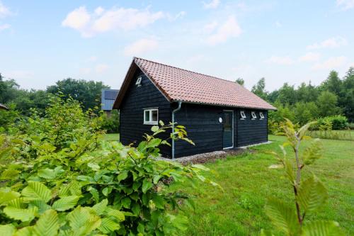 Boshuisje Luna | 4 personen - Vakantiepark De Kremmer