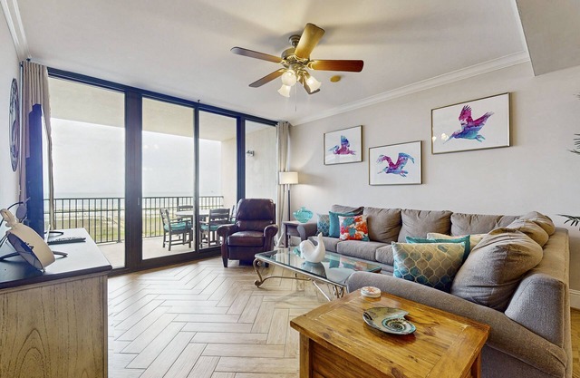 Bright & beachy waterfront condo with pools, tennis, gym, spacious balcony & W/D