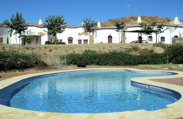 Cave house with private terrace on a small complex