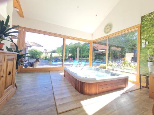 Chambres de charme avec jacuzzi, hammam et piscine, au cœur de la nature près de Gérardmer - FR-1-589-489