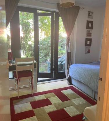 Charming Bedroom with Garden