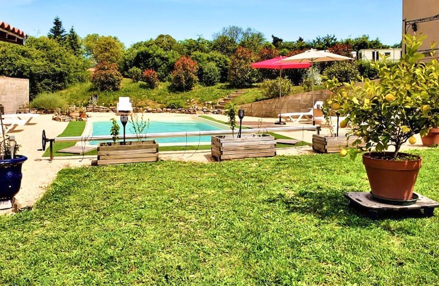Comfortable and tasteful vacation apartment with swimming pool.