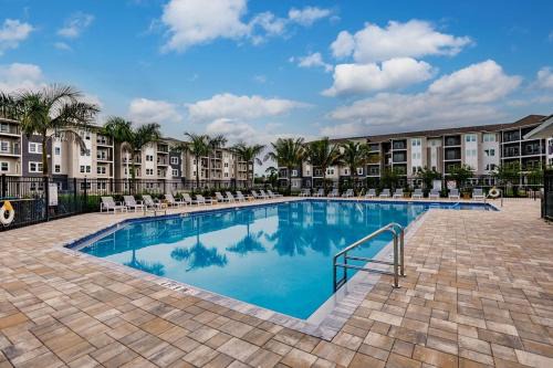 Community oasis with pool & gym access