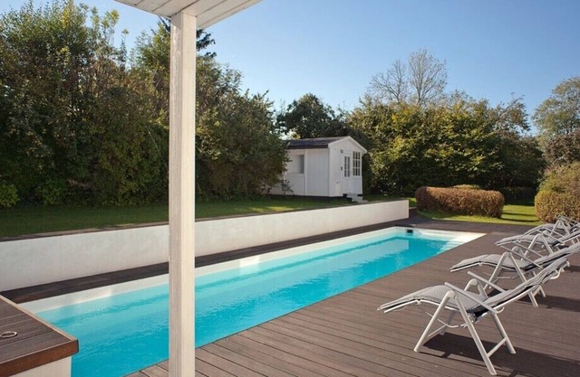 Cottage on park-like grounds with heated swimming pool