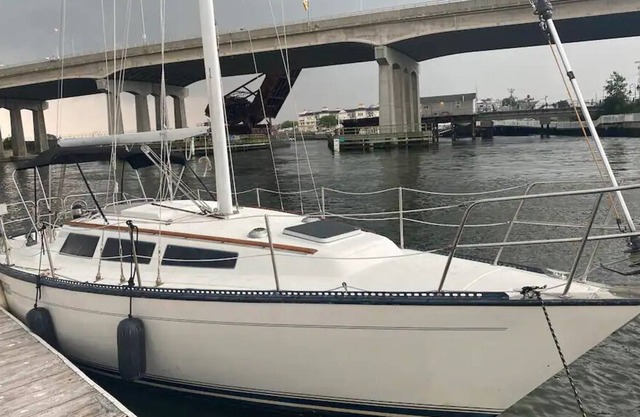 Cozy, Comfy and Quaint Black Sailboat