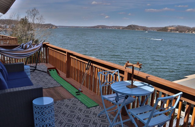 Cozy top floor condo with fireplace and panoramic view of the main channel