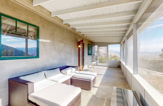 Custom-crafted acreage with sunroom & clawfoot tub