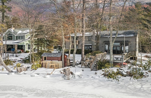 Deck w/Lake Views, Fireplace, Shuffleboard, and Office | Lakeside Retreat