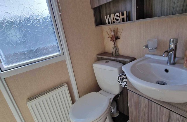Dog friendly, 2-bedroom chalet style caravan facing Fantasy Island, Ingoldmells