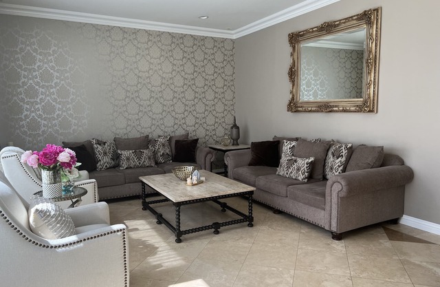 Elegant and Spacious home with a private backyard and pool.