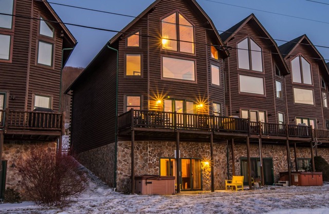 Enjoy lake access and ski slope views!