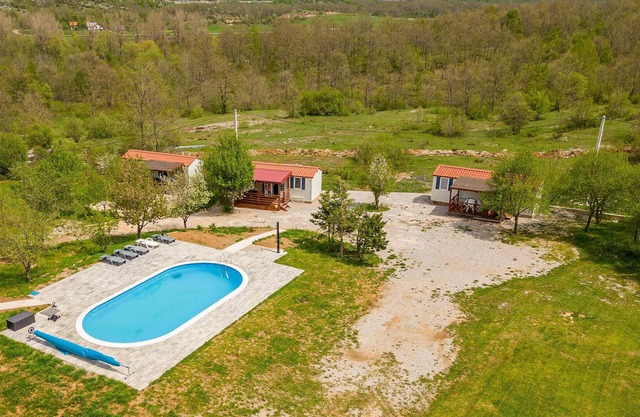 Enjoy your vacation close to nature in this vacation home with pool.
