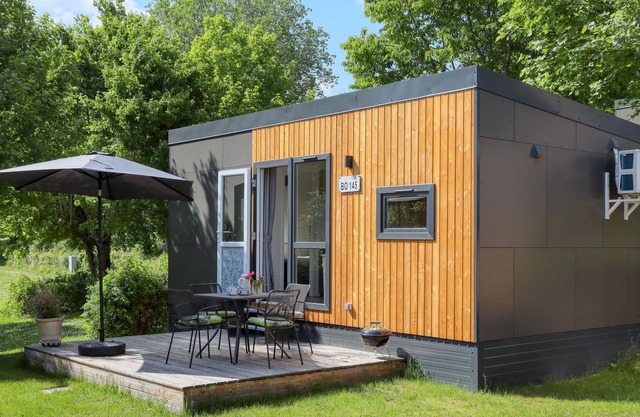 Experience a real Tiny House vacation close to nature at Camping Park Wemding!