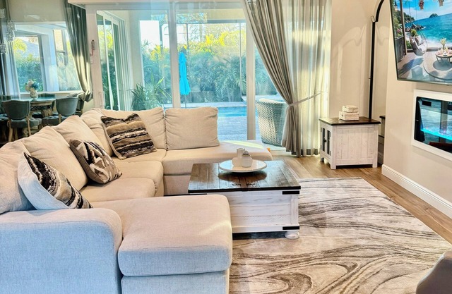 Experience The Ultimate Luxury: 4 BR/3 BA, Heated Pool, Lanai, Fire Pit
