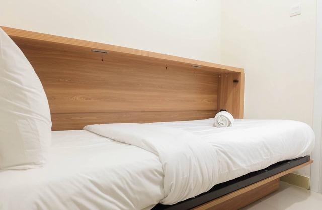 Fully Furnished and Comfortable 2BR Green Pramuka Apartment